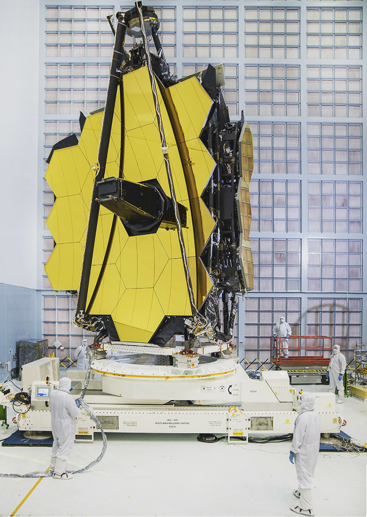 Folding wings of the Webb primary mirror. Image by NASA, Chris Gunn used under fair use 