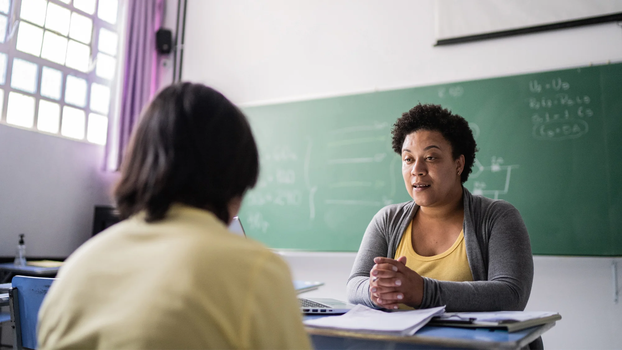 Edutopia - teacher talking with student