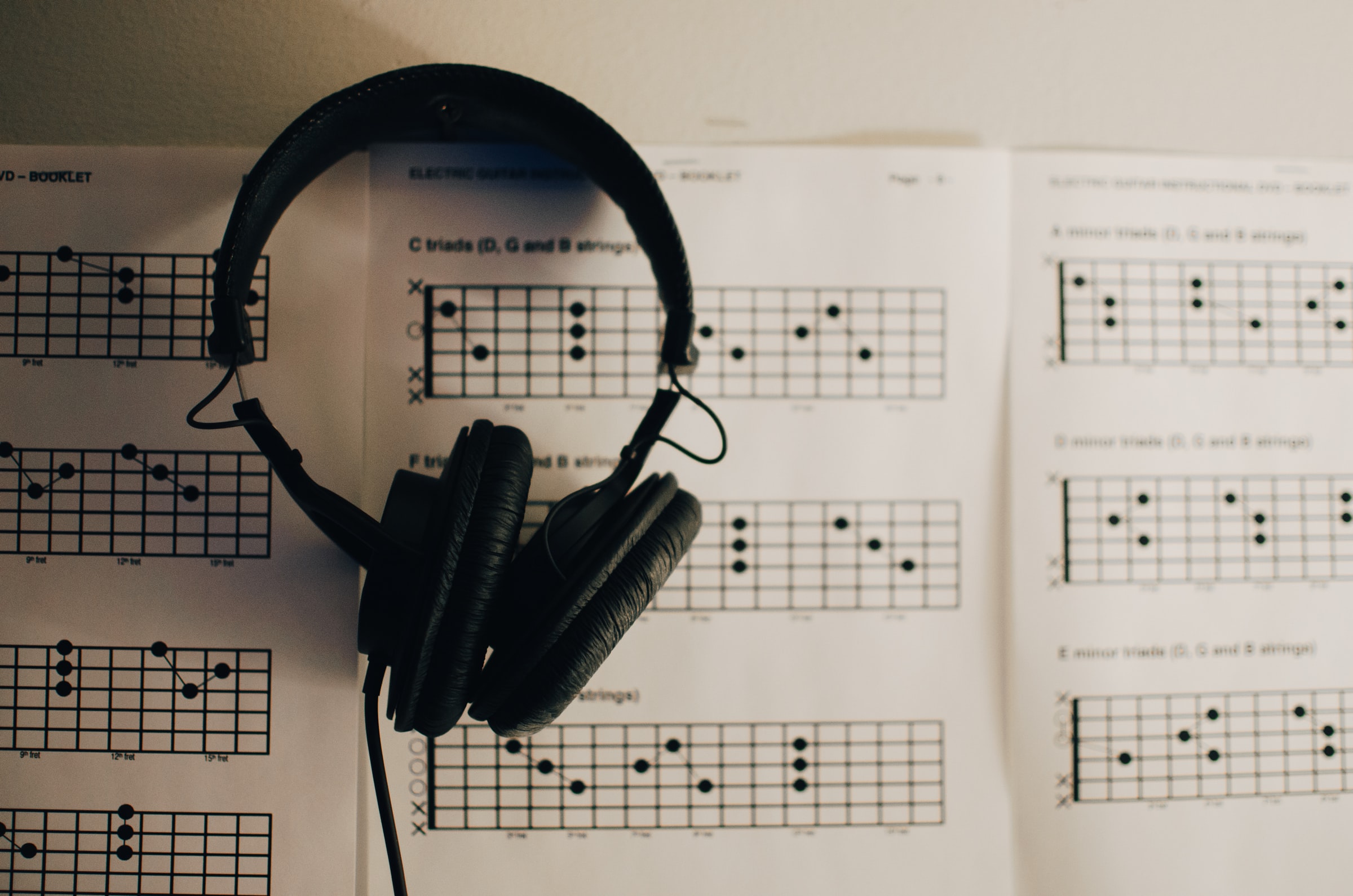 Headset on Sheet Music - Credit Kelly Sikkema Unsplash