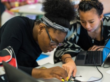 Two_Women_Working_on_Tech